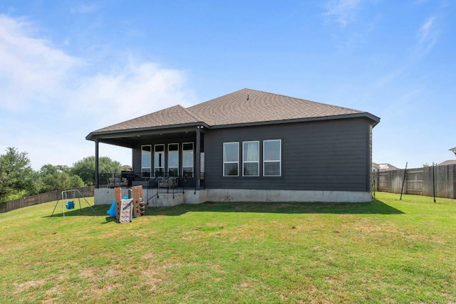 112 Bittik Cv, Georgetown, TX 78628 - rear view of property featuring a fenced backyard and roof with shingles