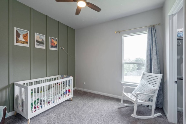 112 Bittik Cv, Georgetown, TX 78628 - carpeted bedroom featuring a crib and a ceiling fan
