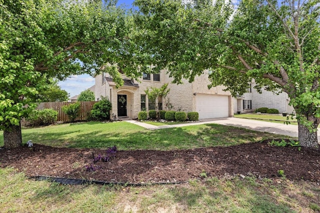 view of front of house with fence, concrete driveway, a front lawn, and a garage