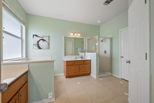 12401 Fairfax Ridge Pl, Austin, TX 78738 - bathroom with baseboards, visible vents, a shower stall, and vanity