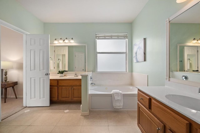 12401 Fairfax Ridge Pl, Austin, TX 78738 - full bath featuring a sink, tile patterned flooring, a bath, and two vanities