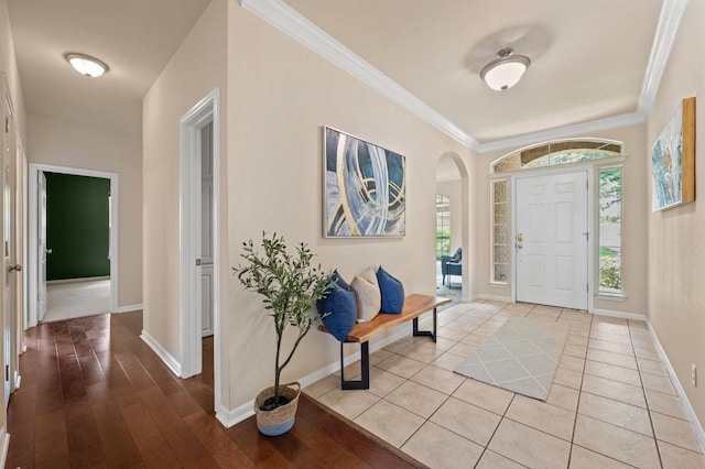 12401 Fairfax Ridge Pl, Austin, TX 78738 - foyer featuring plenty of natural light, arched walkways, baseboards, and ornamental molding