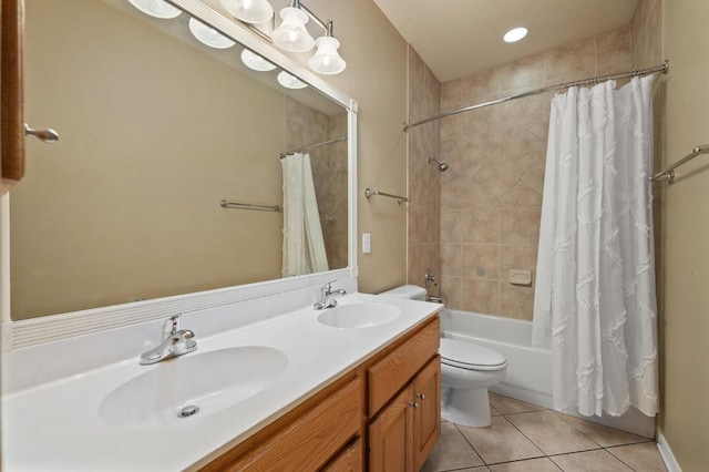 12401 Fairfax Ridge Pl, Austin, TX 78738 - bathroom featuring a sink, tile patterned flooring, toilet, and shower / tub combo
