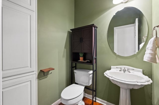 12401 Fairfax Ridge Pl, Austin, TX 78738 - half bathroom featuring toilet and baseboards