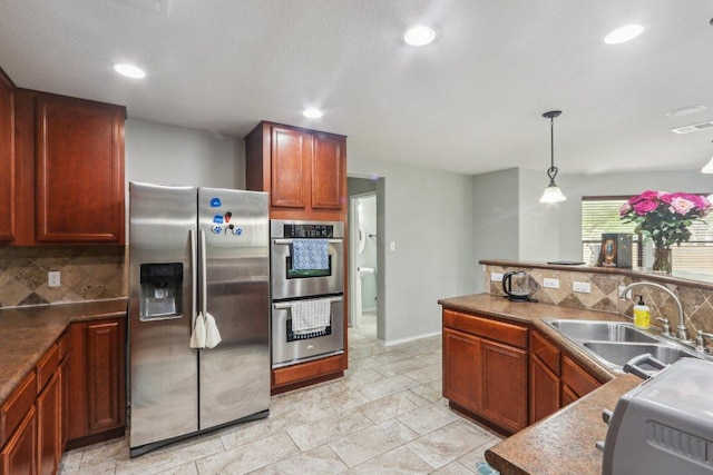 304 Gold Star Dr, Cedar Park, TX 78613 - kitchen featuring appliances with stainless steel finishes, backsplash, recessed lighting, and decorative light fixtures