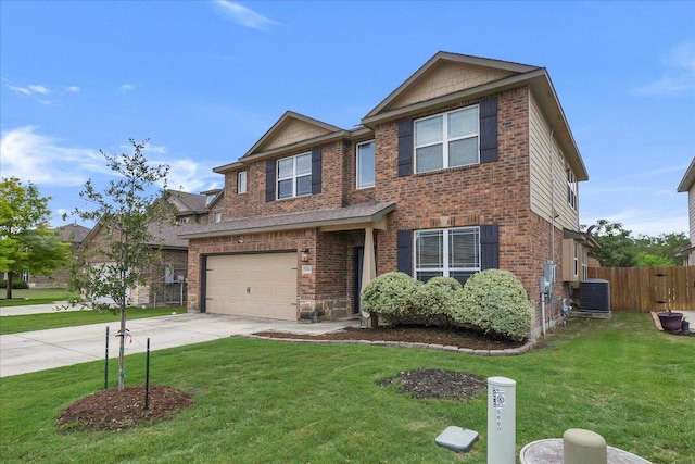 5684 Sabbia Dr, Round Rock, TX 78665 - view of front of house featuring concrete driveway, brick siding, and a garage