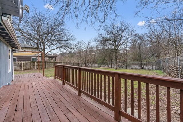 1802 Webberville Rd, Austin, TX 78721 - deck with a fenced backyard and a yard