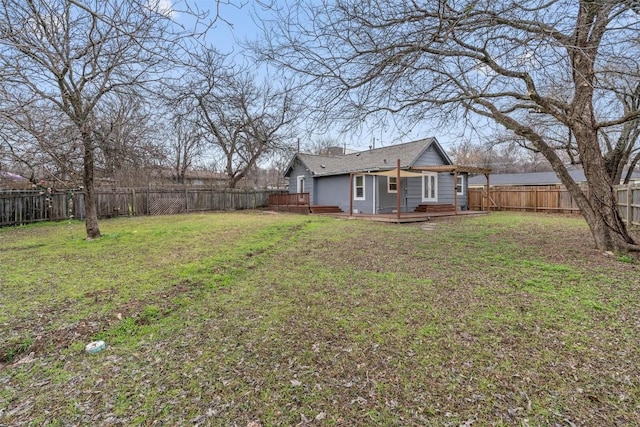 1802 Webberville Rd, Austin, TX 78721 - view of yard with a fenced backyard and a wooden deck