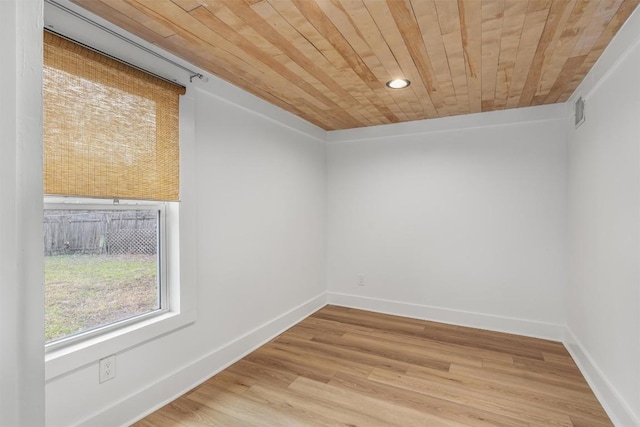 1802 Webberville Rd, Austin, TX 78721 - spare room featuring visible vents, light wood-style floors, baseboards, recessed lighting, and wood ceiling