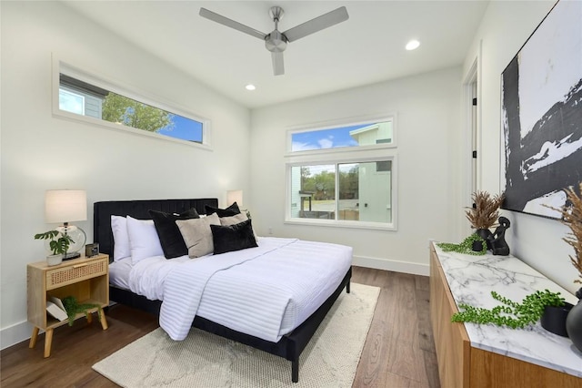 bedroom featuring ceiling fan, recessed lighting, and wood finished floors