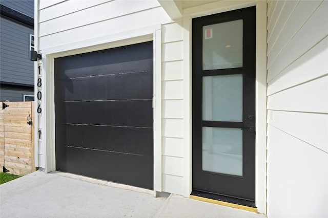 entrance to property featuring a garage