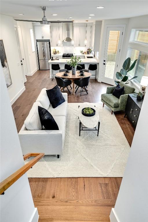 living area featuring recessed lighting and wood finished floors