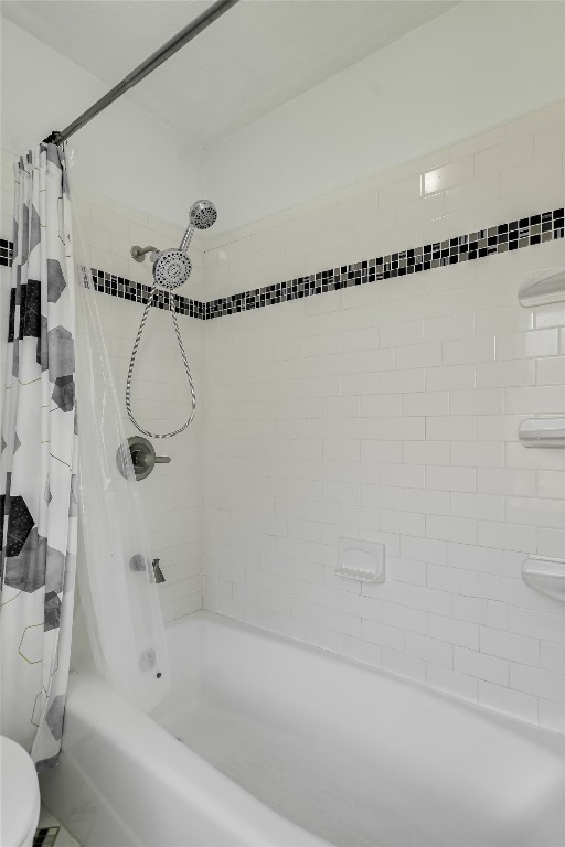 full bathroom featuring shower / tub combo