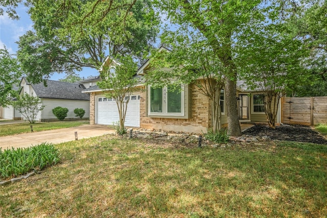 view of front of home featuring concrete driveway, a garage, and brick siding