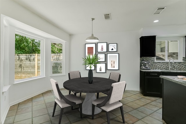 dining space with baseboards