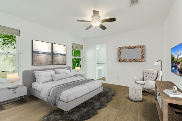 4015 Alexandria Dr, Austin, TX 78749 - bedroom featuring multiple windows, ensuite bathroom, and a ceiling fan