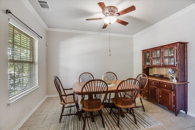 1901 Meandering Meadows Dr, Pflugerville, TX 78660 - dining area featuring light tile patterned flooring, ceiling fan, visible vents, and ornamental molding