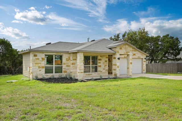 5407 Thunderbird St, Lago Vista, TX 78645 - view of front of home featuring a garage, fence, stone siding, and concrete driveway