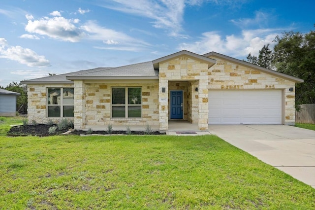 5407 Thunderbird St, Lago Vista, TX 78645 - view of front of home with an attached garage, stone siding, driveway, and a front yard