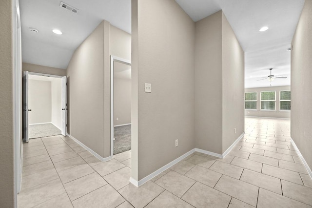 5407 Thunderbird St, Lago Vista, TX 78645 - hallway with visible vents, recessed lighting, baseboards, and light tile patterned floors