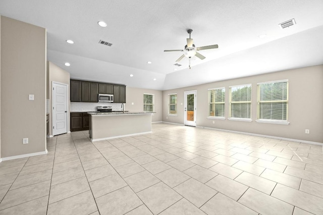 5407 Thunderbird St, Lago Vista, TX 78645 - unfurnished living room with baseboards, ceiling fan, recessed lighting, and visible vents