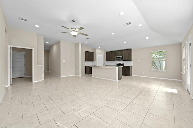5407 Thunderbird St, Lago Vista, TX 78645 - unfurnished living room with recessed lighting, a ceiling fan, visible vents, and light tile patterned flooring