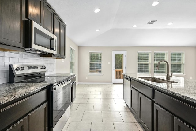 5407 Thunderbird St, Lago Vista, TX 78645 - kitchen with appliances with stainless steel finishes, a wealth of natural light, a sink, and visible vents