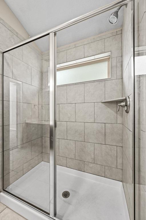 5407 Thunderbird St, Lago Vista, TX 78645 - full bath featuring a stall shower