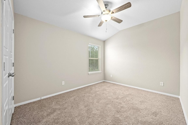 5407 Thunderbird St, Lago Vista, TX 78645 - carpeted empty room featuring ceiling fan, baseboards, and lofted ceiling