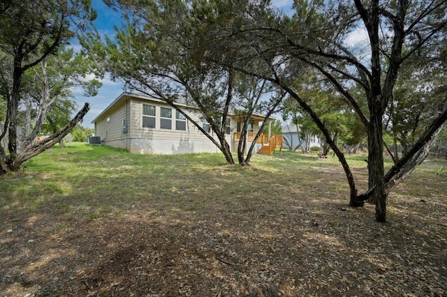 5407 Thunderbird St, Lago Vista, TX 78645 - view of yard featuring cooling unit