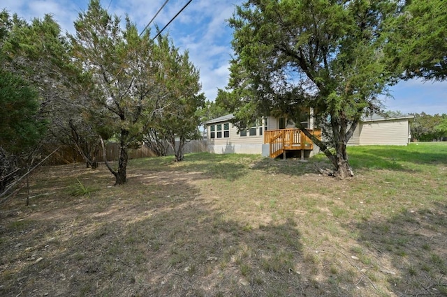 5407 Thunderbird St, Lago Vista, TX 78645 - view of yard featuring a wooden deck