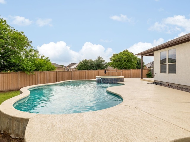 2040 Elaina Loop, Leander, TX 78641 - view of pool with a fenced backyard, a patio area, and a pool with connected hot tub