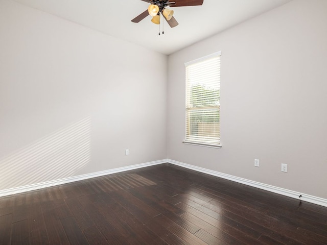 2040 Elaina Loop, Leander, TX 78641 - unfurnished room with ceiling fan, dark wood finished floors, and baseboards