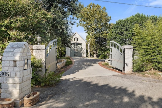805 Brooks Hollow Rd, Lakeway, TX 78734 - view of asphalt driveway featuring a gated entry and a gate
