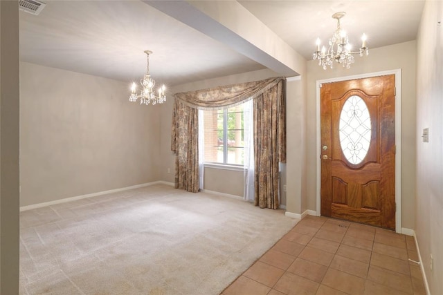 7300 Greenhaven Dr, Austin, TX 78757 - carpeted foyer featuring a chandelier, baseboards, and tile patterned floors