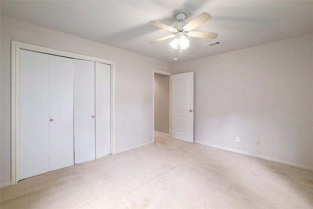7300 Greenhaven Dr, Austin, TX 78757 - unfurnished bedroom with a closet, light colored carpet, baseboards, and a ceiling fan