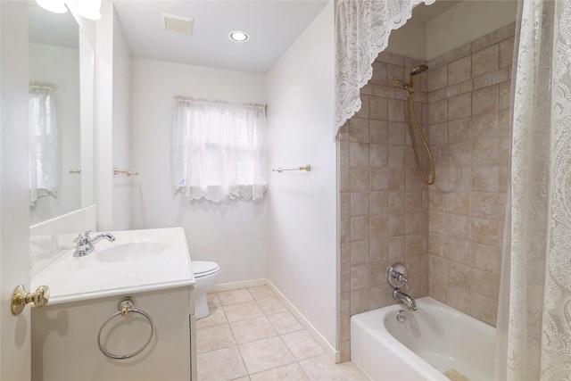 7300 Greenhaven Dr, Austin, TX 78757 - bathroom featuring shower / tub combo, tile patterned floors, toilet, vanity, and baseboards