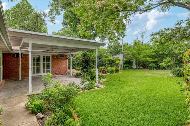 7300 Greenhaven Dr, Austin, TX 78757 - view of green lawn with french doors, a patio area, and ceiling fan
