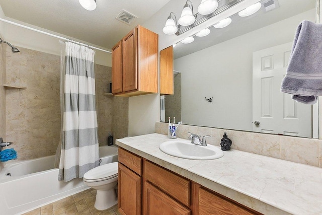 full bathroom with vanity, toilet, shower / tub combo, and visible vents