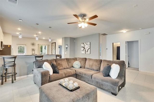240 Olympic Park Dr, Kyle, TX 78640 - living room with light tile patterned floors, a ceiling fan, and recessed lighting