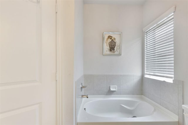 240 Olympic Park Dr, Kyle, TX 78640 - full bath featuring a bath and a wealth of natural light