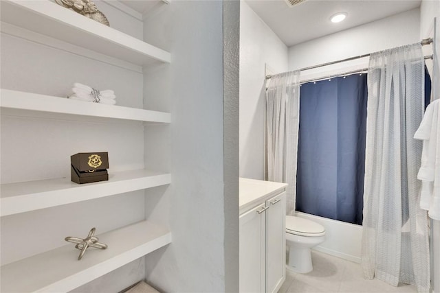 240 Olympic Park Dr, Kyle, TX 78640 - bathroom featuring tile patterned floors, vanity, toilet, and shower / tub combo with curtain