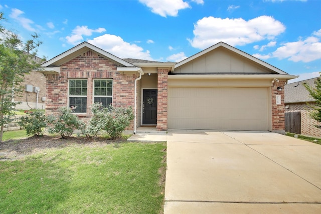 view of front of home featuring a garage, a front yard, brick siding, board and batten siding, and concrete driveway