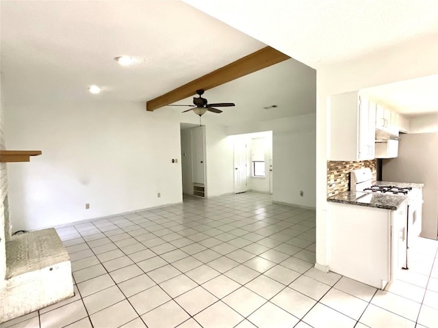 10810 Calcite Trl, Austin, TX 78750 - unfurnished living room featuring ceiling fan, beam ceiling, a fireplace with raised hearth, light tile patterned floors, and visible vents