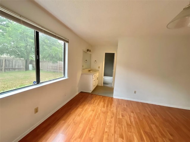 10810 Calcite Trl, Austin, TX 78750 - empty room with baseboards and light wood finished floors