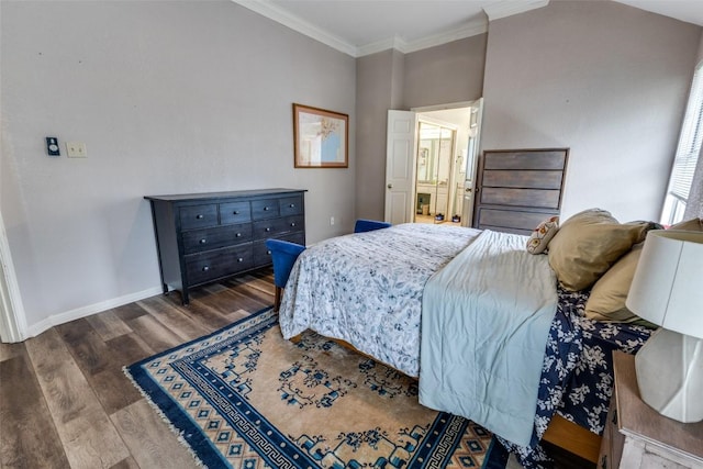 bedroom with baseboards, ornamental molding, and wood finished floors