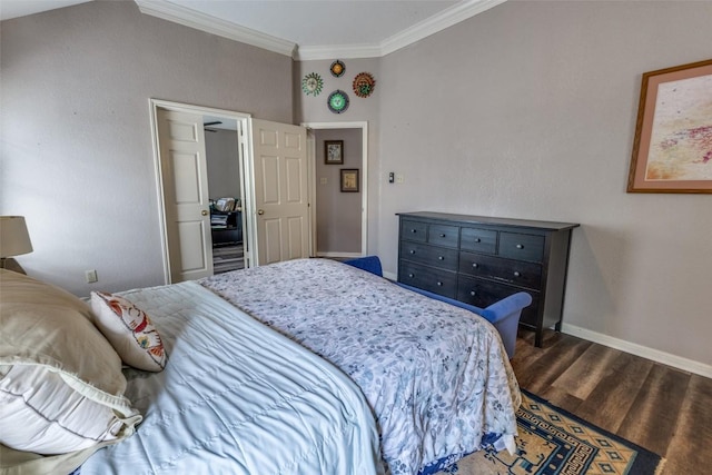 bedroom featuring crown molding, baseboards, and dark wood-type flooring