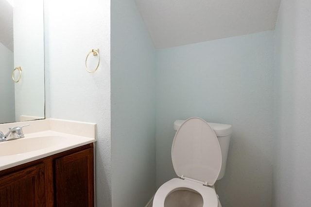 1712 Southwestern Dr, Round Rock, TX 78664 - half bathroom with lofted ceiling and vanity