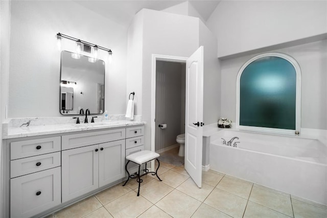 103 Sierra Ridge Dr, San Marcos, TX 78666 - bathroom with toilet, tile patterned flooring, a bath, and vanity