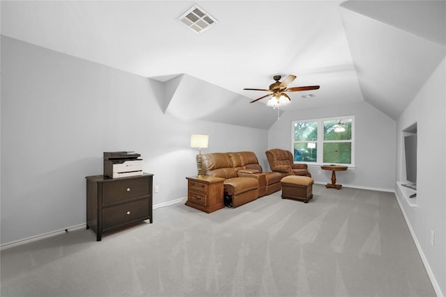 103 Sierra Ridge Dr, San Marcos, TX 78666 - carpeted living area with vaulted ceiling, visible vents, baseboards, and a ceiling fan